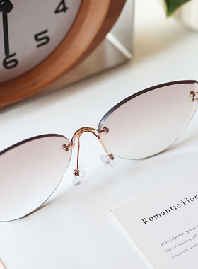 新款时尚太阳镜女无框海洋片墨镜欧美潮流高级感金属太阳眼镜