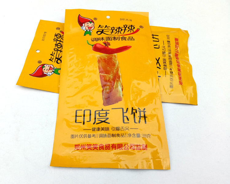 笑辣辣印度飞饼 30g*40袋包邮 辣条辣片怀旧零食宿舍麻辣食品 - 图1