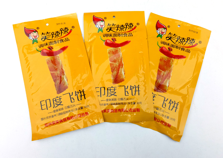 笑辣辣印度飞饼 30g*40袋包邮 辣条辣片怀旧零食宿舍麻辣食品 - 图0