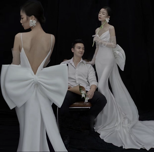 Свадебное платье подходит для фотосессий для влюбленных с бантиком, с открытой спиной, крой «рыбий хвост», эффект подтяжки