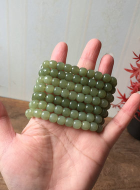 天然和田玉手链桶珠单圈黄口料