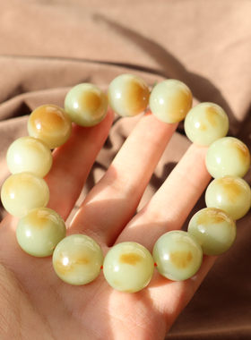 新疆且末黄口带糖聚宝盆16mm手串