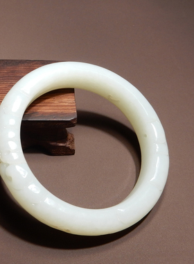 新疆且末料羊脂白玉59mm雕花手镯