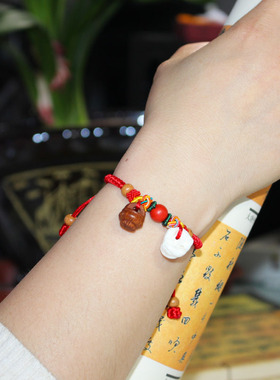 手工编织野生桃木桃核红绳手链