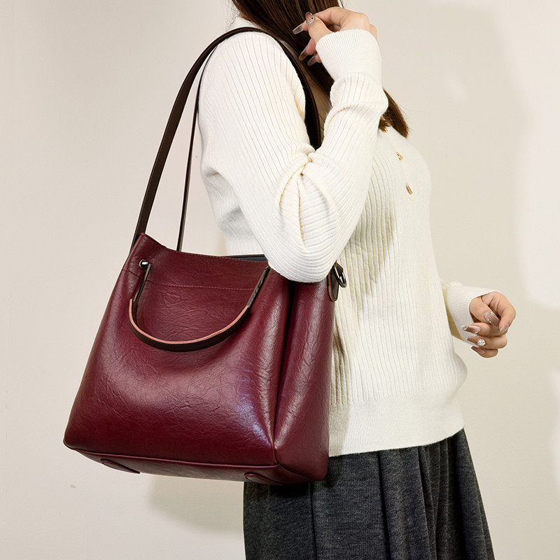 头层牛皮单肩斜挎包女包软真皮手提包妈妈包大容量水桶包2025新款,淘宝优惠券,粉丝福利购,淘宝优惠卷