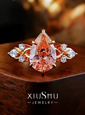 4ct《柔焰轻羽》帕帕拉恰粉橙色925银戒指温柔甜美水滴镀玫瑰金托