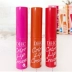 Nhật Bản DHC Lip Balm / Butterfly Cui Shi New Color Moisturising Lip Balm Lip Gloss Orange Pink 3 Color - Son môi