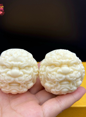 文玩象牙果雕刻核桃四座楼狮子头