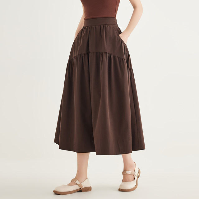 Elastic high-waisted irregular pocket skirt for women 2025 new spring and summer umbrella skirt slimming cover and versatile for women