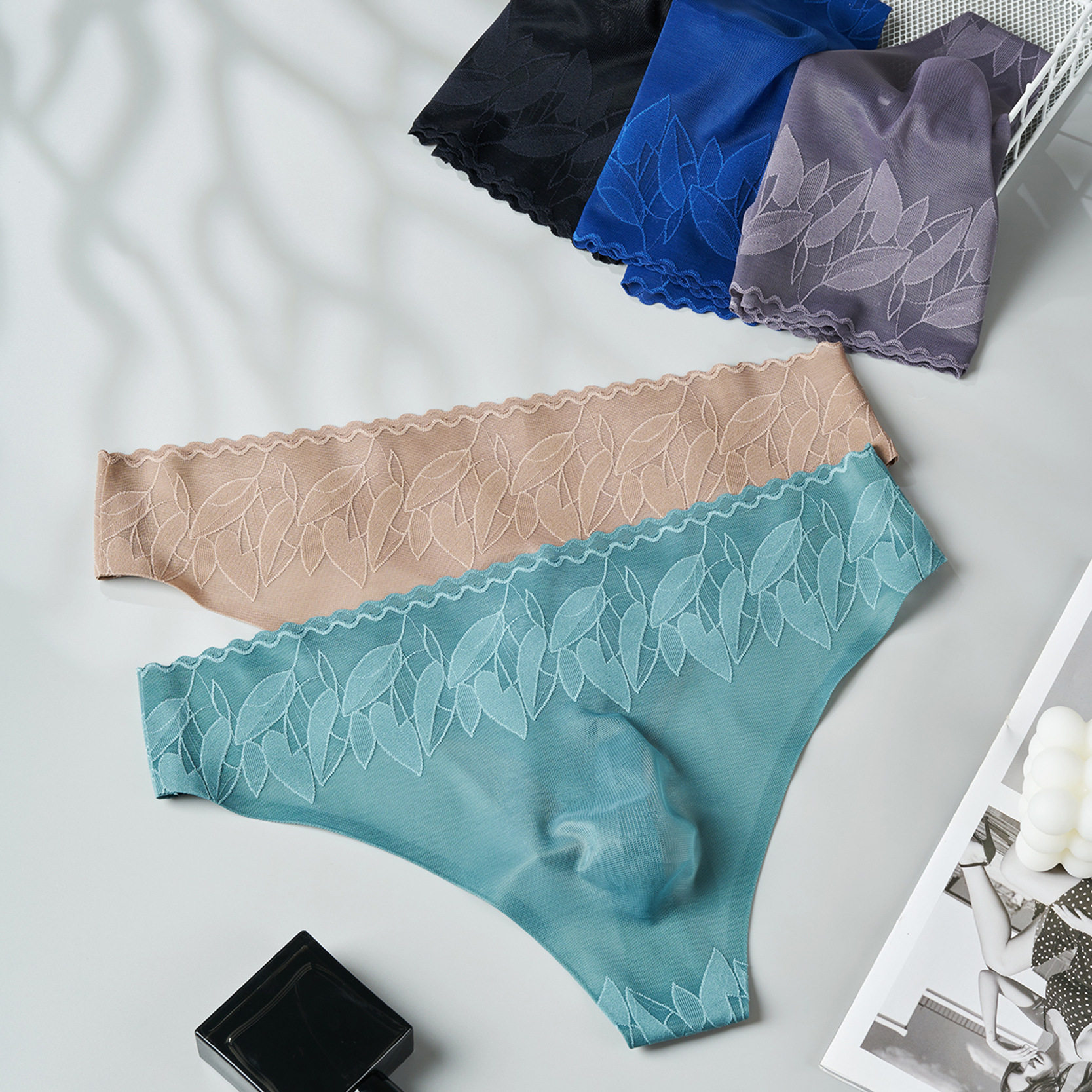 男士性感丁字裤冰感蕾丝腰边单层透气速干无痕内裤一片式欧美T裤,淘宝优惠券,粉丝福利购,淘宝优惠卷