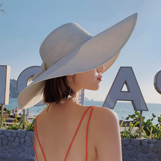 Foldable natural material large brim with wind cord