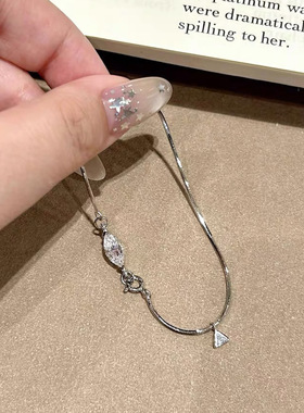 S925纯银马眼手链女小众轻奢贵气蛇骨链手环简约百搭精致流苏手饰