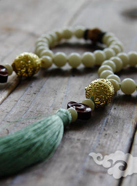 流苏压襟手钏送古方香丸