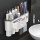 Multifunctional toothbrush storage rack wall-mounted toothpaste squeezer