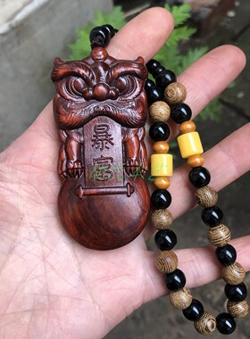 阿根廷绿檀犀牛角实木雕刻狮子