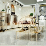 Получите в магазине одежды на полке на полке золото -розовая висящая навеса по приземлению висящая одежда для женской одежды