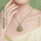 Chow Tai Sang Natural Hotan Jade Buddha Necklace