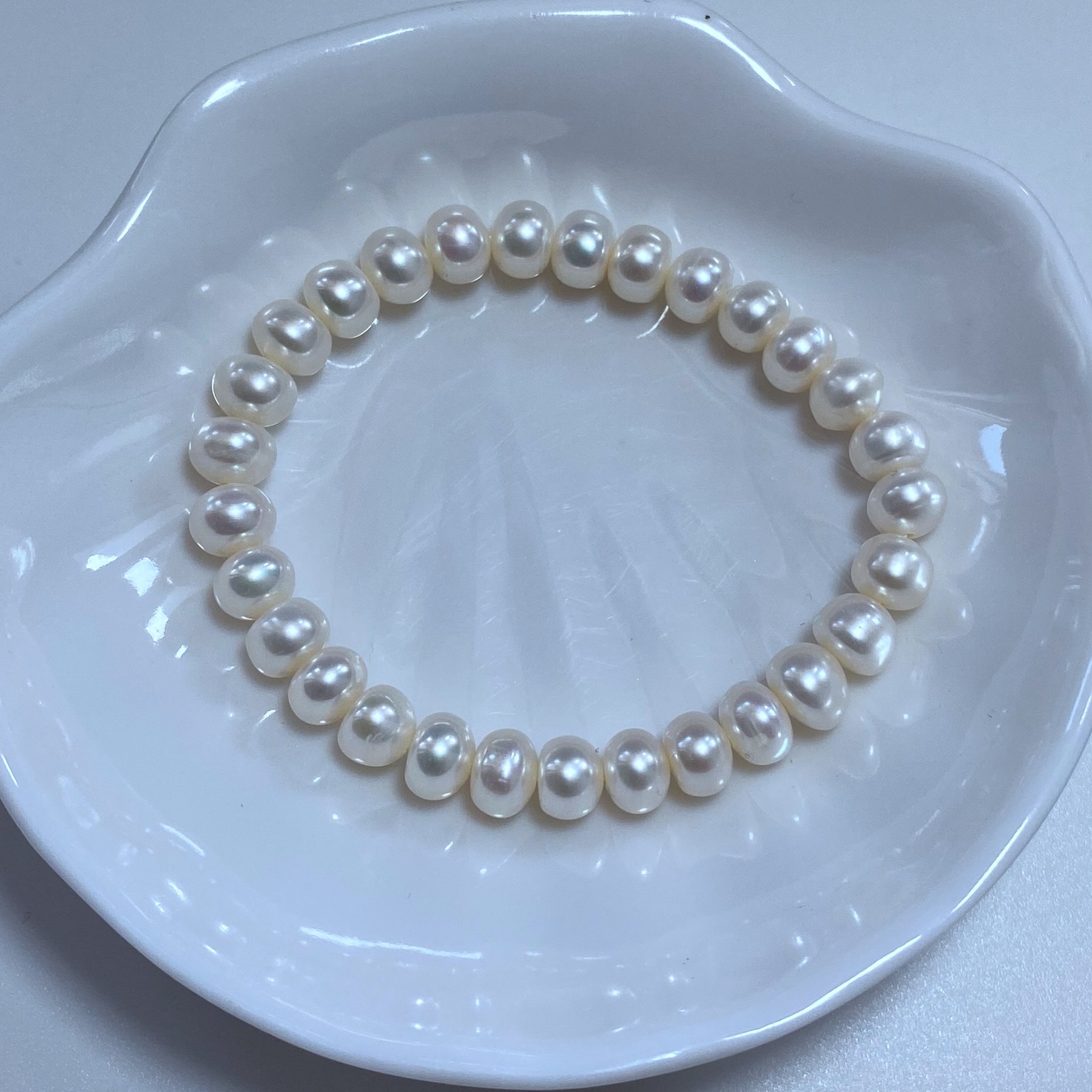 7-8mm天然白色扁圆淡水珍珠弹力绳手链松紧款手串女款无核珠,淘宝优惠券,粉丝福利购,淘宝优惠卷