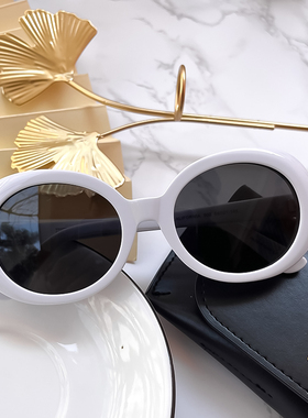 高级感米白色椭圆形偏光墨镜
