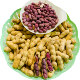 Four red boiled salted dried peanuts as a snack