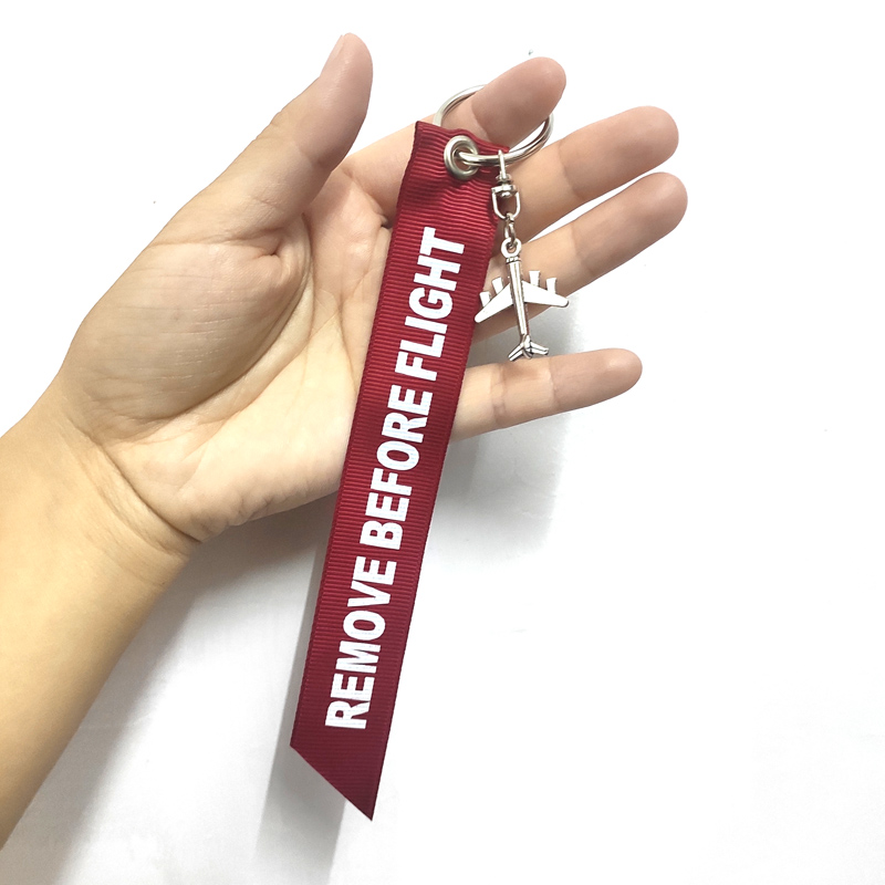 1件包邮REMOVE BEFORE FLIGHT飘带款钥匙扣包包挂件航空礼品 - 图1