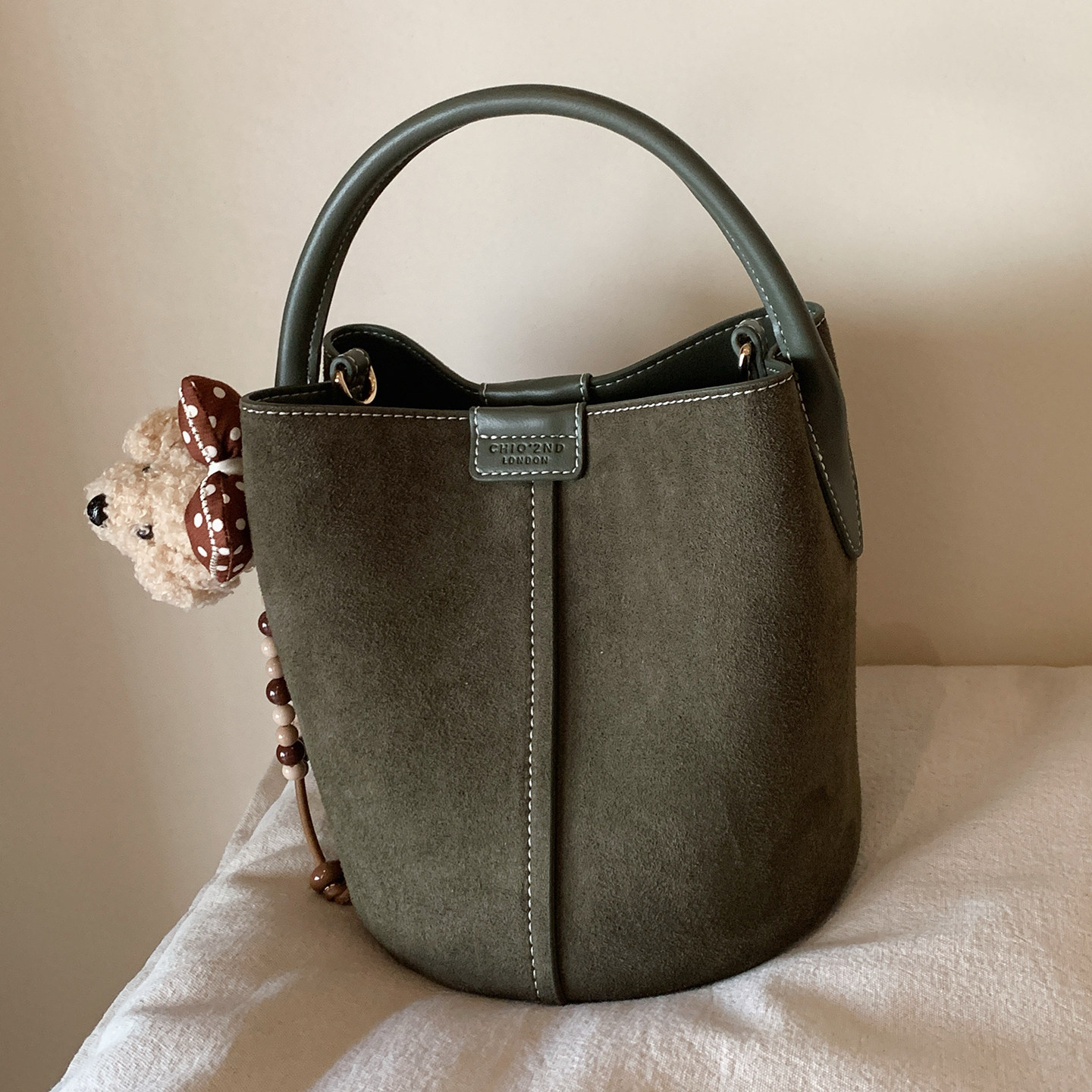 南风Chio2nd 牛纤绒漫野秋声水桶包包女式2026新款手提单肩斜挎包,淘宝优惠券,粉丝福利购,淘宝优惠卷