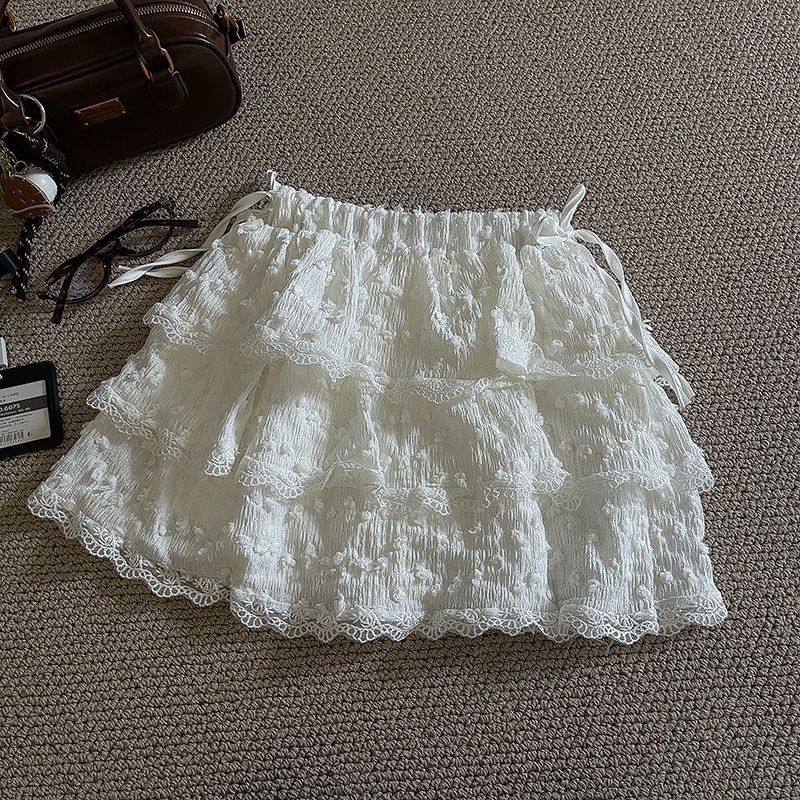 奶杏色蕾丝边半身裙女2025春夏设计感小众高腰毛毛球蓬蓬蛋糕裙子,淘宝优惠券,粉丝福利购,淘宝优惠卷