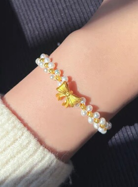 金色在逃公主蝴蝶结手链女2025新款淡水珍珠手串编织手绳送女朋友