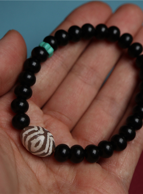 原创 印尼黑底椰蒂椰壳精品女士手链单圈配佛眼蚀花玛瑙顶珠16cm