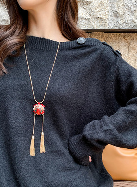 丽新折扣女装当季新款戏曲毛衣链