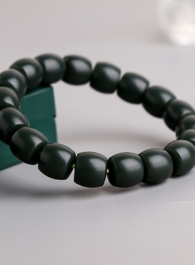 塔青一细料直切桶珠12mm玉石手串