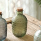 Embossed vintage engraved glass beverage bottle