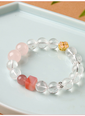 国风粉黛桃花优化冰透白水晶手串