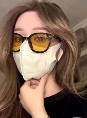 少女橘黄色学生太阳眼镜黑色遮脸