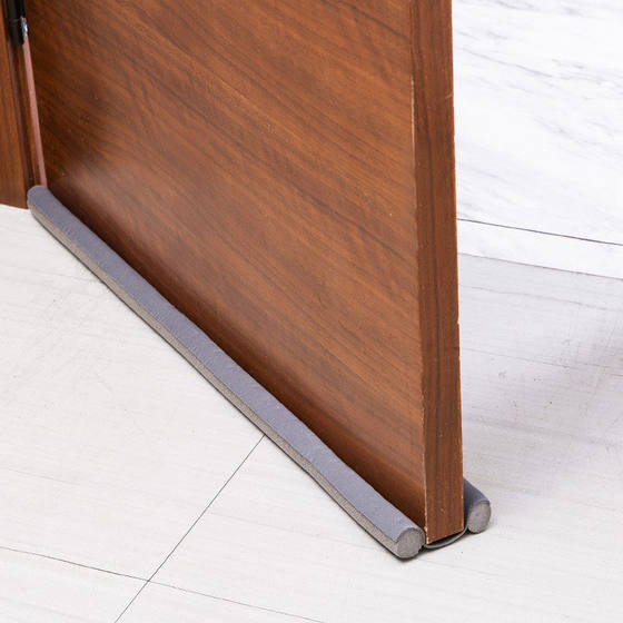 Door seam and door bottom sealing strip to prevent wind leakage and cockroach prevention