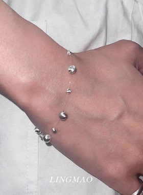 银色仿猫眼珠鱼线隐形手链高级感