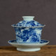 Jingdezhen hand-painted horseshoe-shaped three-cai covered bowl, underglaze blue and white porcelain landscape tea bowl, Kung Fu tea set