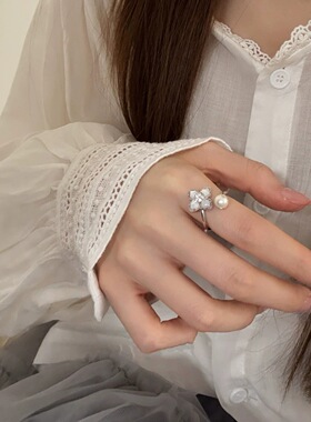S925镀银甜美精致花朵戒指女轻奢仿珍珠交叉开口指环ins风小众网