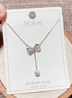 简悦银饰S925纯银微镶碎贝珍珠流苏蝴蝶结时尚锁骨项链女百搭