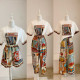 Australian niche Michelle series hand-painted printed short-sleeved T-shirt pants wide-leg pants suit 2026 new holiday long skirt