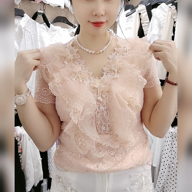ເສື້ອລາຍດອກສາມມິຕິທີ່ມີລູກປັດທີ່ມີເນື້ອໜັງບາງໆມີເນື້ອຫວານ ແລະເຜັດ