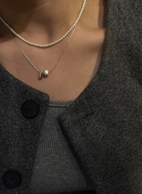 2025新款双层叠戴简约珍珠项链奢华优雅冷淡风小众设计银色蛇骨链