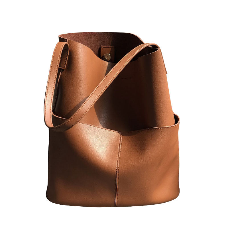 菲色如华新款气质牛皮女休闲水桶包 菲色如华女士包袋