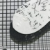 Tide thương hiệu ulzzang phong cách đá cẩm thạch mô hình gạch chéo đen sọc ống phong trào nam và nữ vớ cotton - Vớ bông
