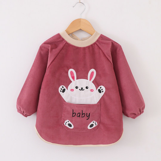 Baby smock, apron and bib worn backwards