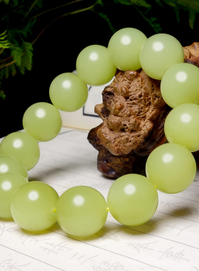 和田玉且末若羌鸡油黄圆珠手串