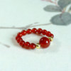 Zhenqiaoge red agate 18K gold bead ring