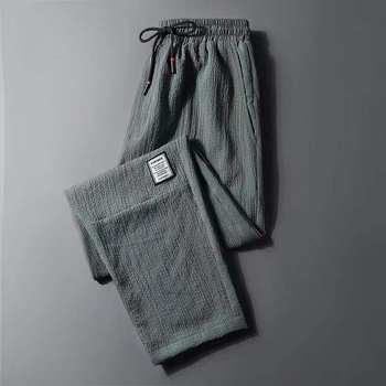 ໂສ້ງກິລາຜູ້ຊາຍ summer elastic waist linen breathable ice silk pants Korean style trendy loose straight casual trousers