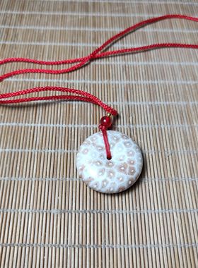 新疆珊瑚化石制作平安扣吊坠饰品石质细腻光滑 独特花纹包邮