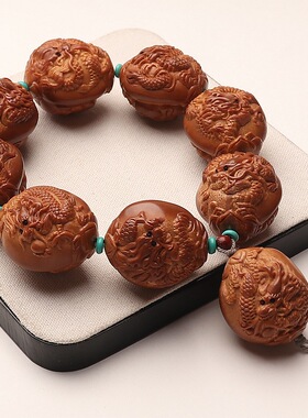 巴西橄榄核大籽手把件浮雕九龙献瑞手持八大财神文玩手串双面雕刻